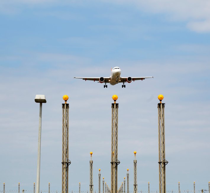 Airplane arriving at airport filled with goods 
